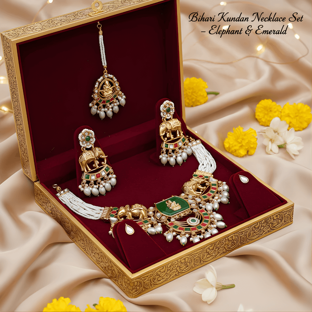 Bihar Kundan necklace set with earrings in a decorative box on a soft fabric background.